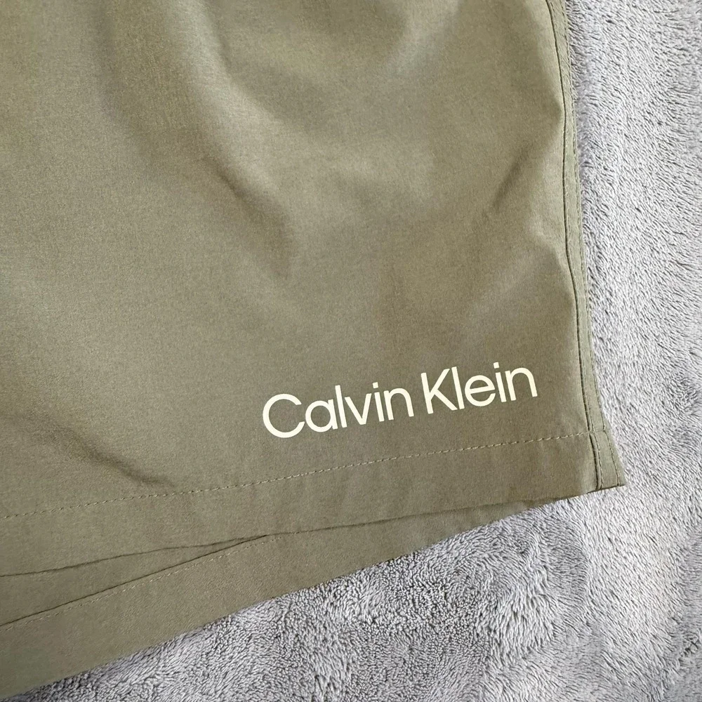 Calvin Klein Swim Shorts Mens Size XL Green Repreve Stretch Lined Trunks